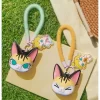 Caixa surpresa com pingente de pitada da série Baby Molly e Baby Tabby