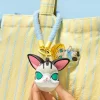 Caixa surpresa com pingente de pitada da série Baby Molly e Baby Tabby