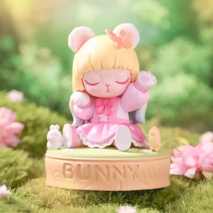 Estatueta de coelho rosa querido