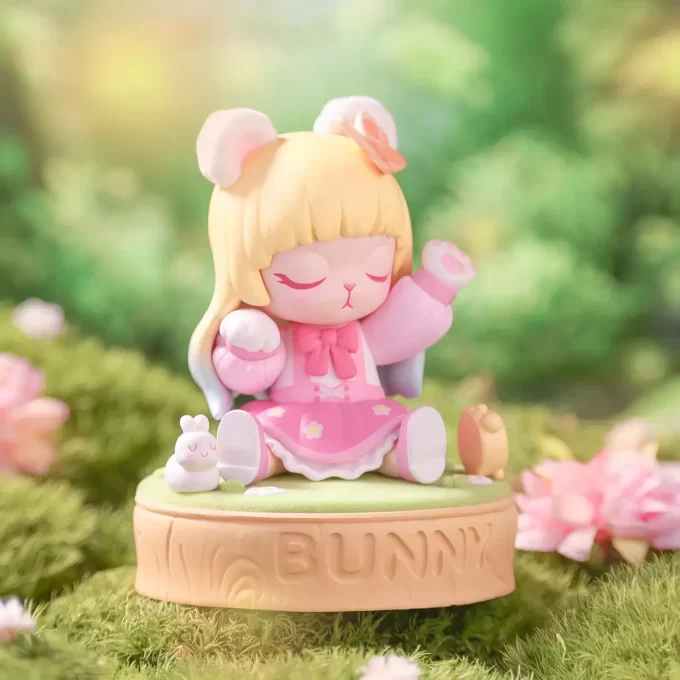 Estatueta de coelho rosa querido