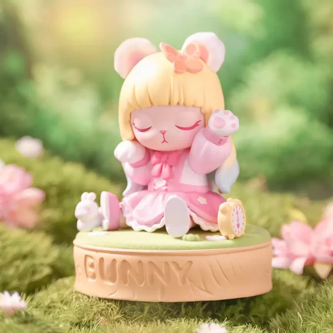 Estatueta de coelho rosa querido