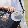 SÉRIE OS MONSTROS CAEM NA NATUREZA – Bolsa tiracolo jeans