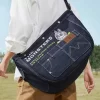 SÉRIE OS MONSTROS CAEM NA NATUREZA – Bolsa tiracolo jeans